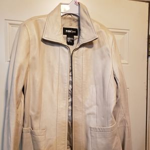 Cream/off white leather jacket.